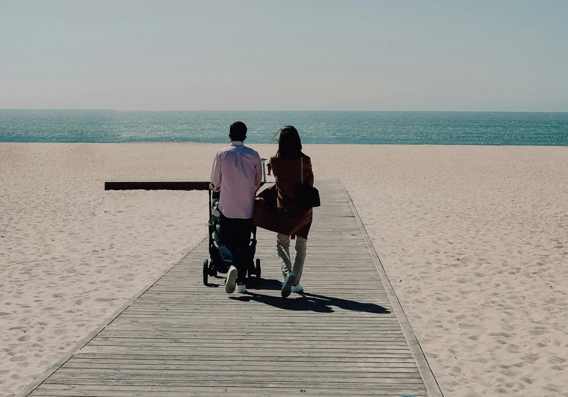 Distant Beach View with Wheelchair