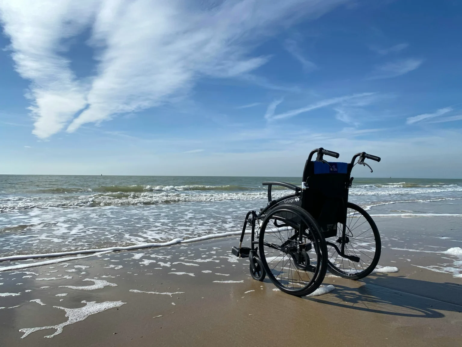 Wheelchair on Deserted Beach